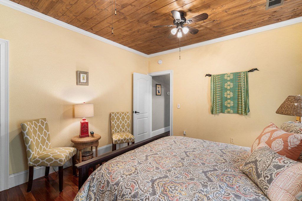5125 Mineral Springs Road Young Harris, GA 30582 - Photo 27 of 62 a bedroom with a bed and a chair