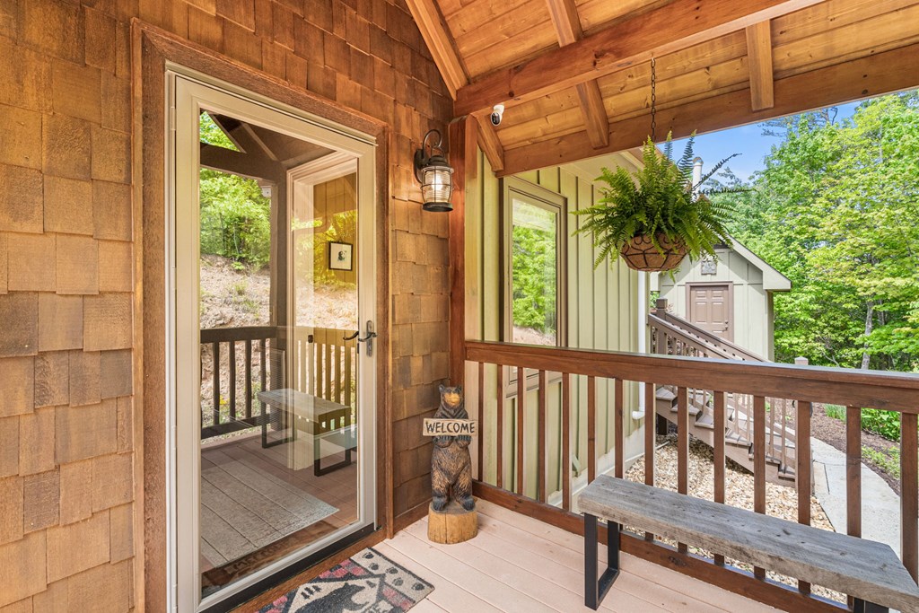 5125 Mineral Springs Road Young Harris, GA 30582 - Photo 43 of 62 a view of a balcony with a potted plant