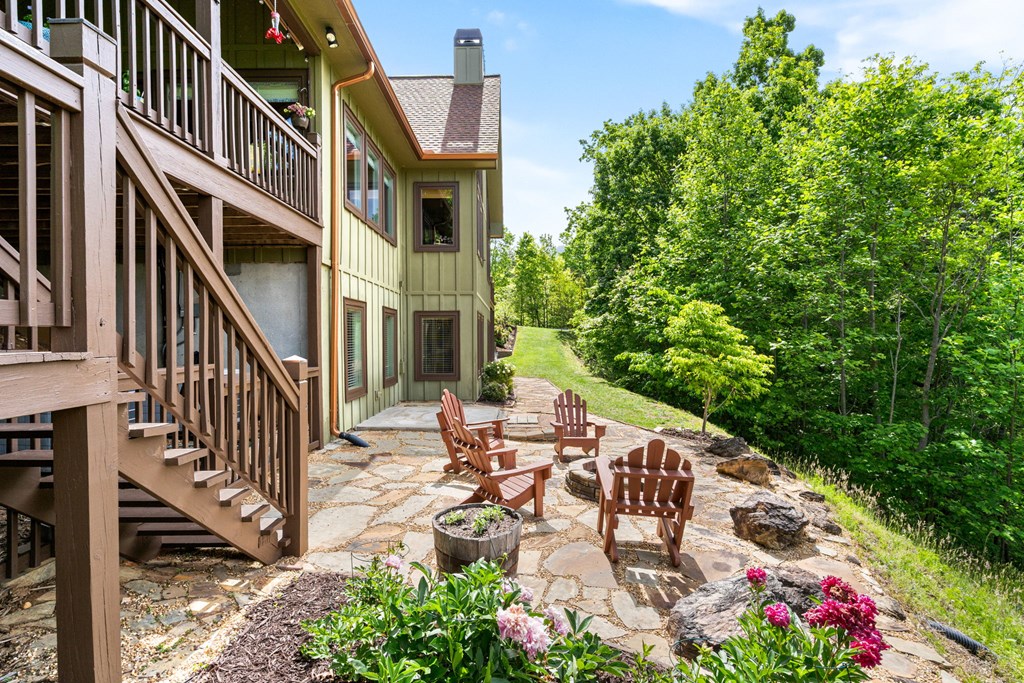 5125 Mineral Springs Road Young Harris, GA 30582 - Photo 48 of 62 a view of a patio with table and chairs and potted plants