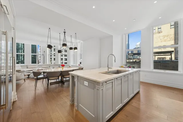 a kitchen with a stove and cabinets