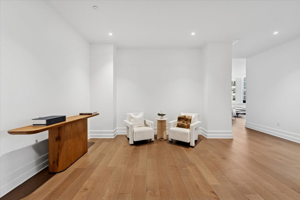 435 North Michigan Avenue, Unit 503 Chicago, IL 60611 - Photo 20 of 48 a living room with furniture and wooden floor