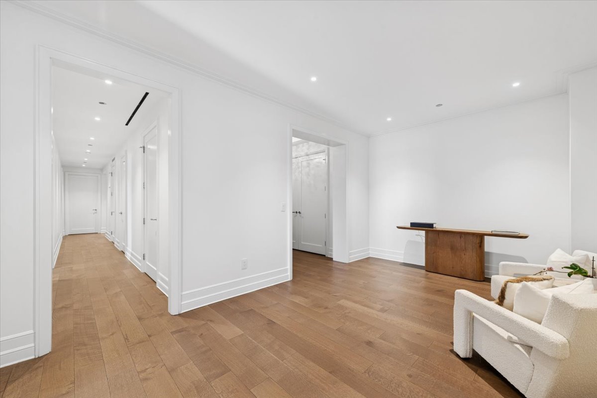 435 North Michigan Avenue, Unit 503 Chicago, IL 60611 - Photo 21 of 48 a view of an empty room with wooden floor and a bathroom