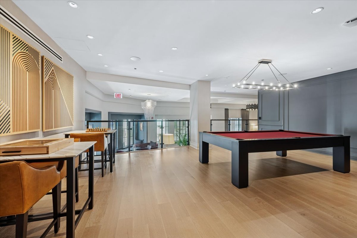 435 North Michigan Avenue, Unit 503 Chicago, IL 60611 - Photo 46 of 48 a living room with furniture a table and a potted plant