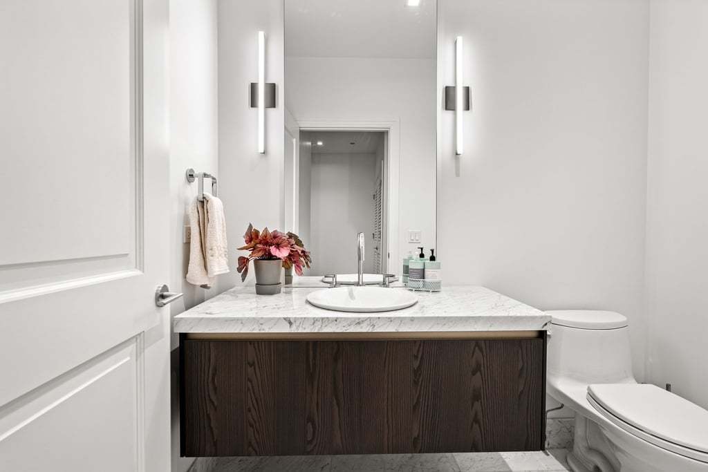363 East Wacker Drive, Unit 4103 Chicago, IL 60601 - Photo 16 of 34 a bathroom with a sink and a toilet