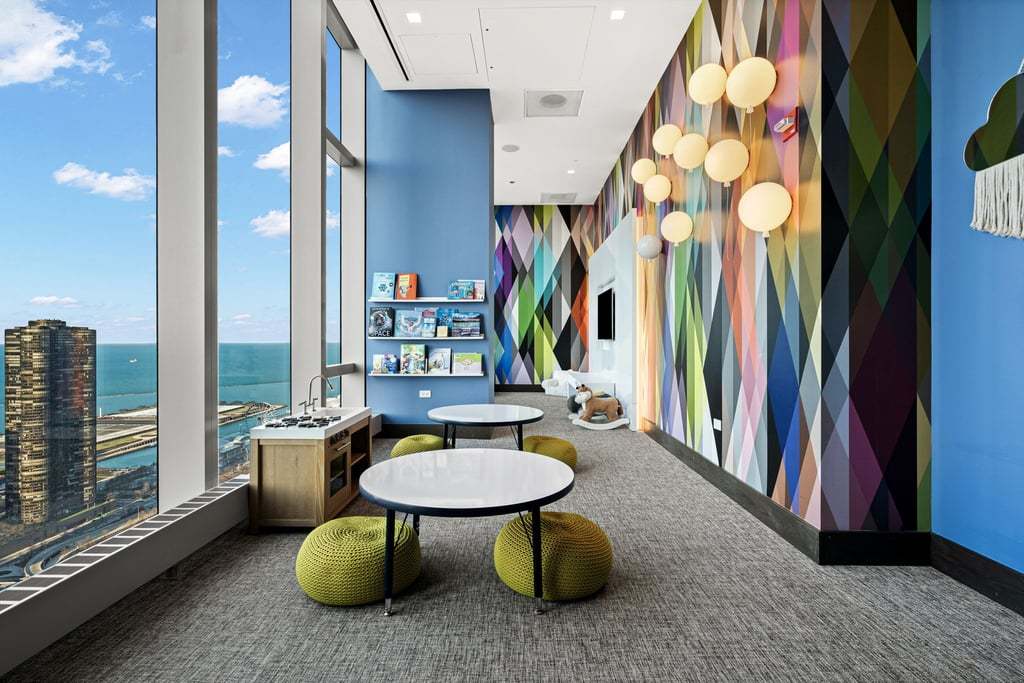 363 East Wacker Drive, Unit 4103 Chicago, IL 60601 - Photo 27 of 34 a view of a dining room with furniture window and wooden floor