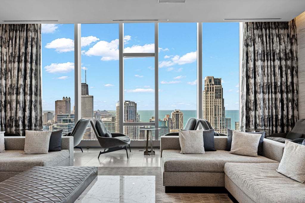 363 East Wacker Drive, Unit 4103 Chicago, IL 60601 - Photo 31 of 34 a living room with furniture and a large window