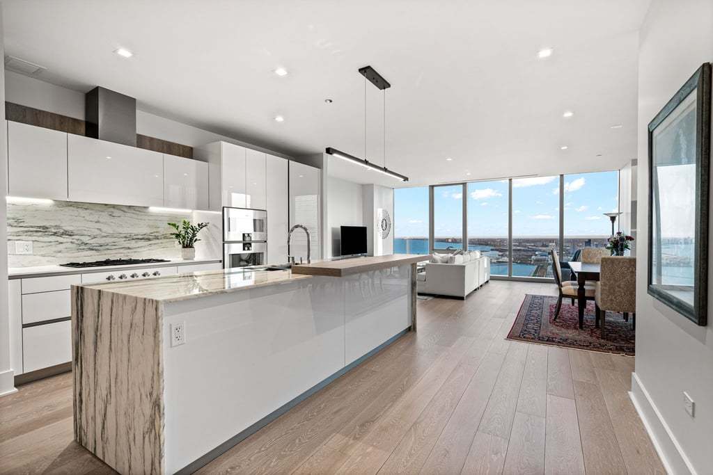 363 East Wacker Drive, Unit 4103 Chicago, IL 60601 - Photo 5 of 34 a kitchen with counter top space a sink appliances and cabinets