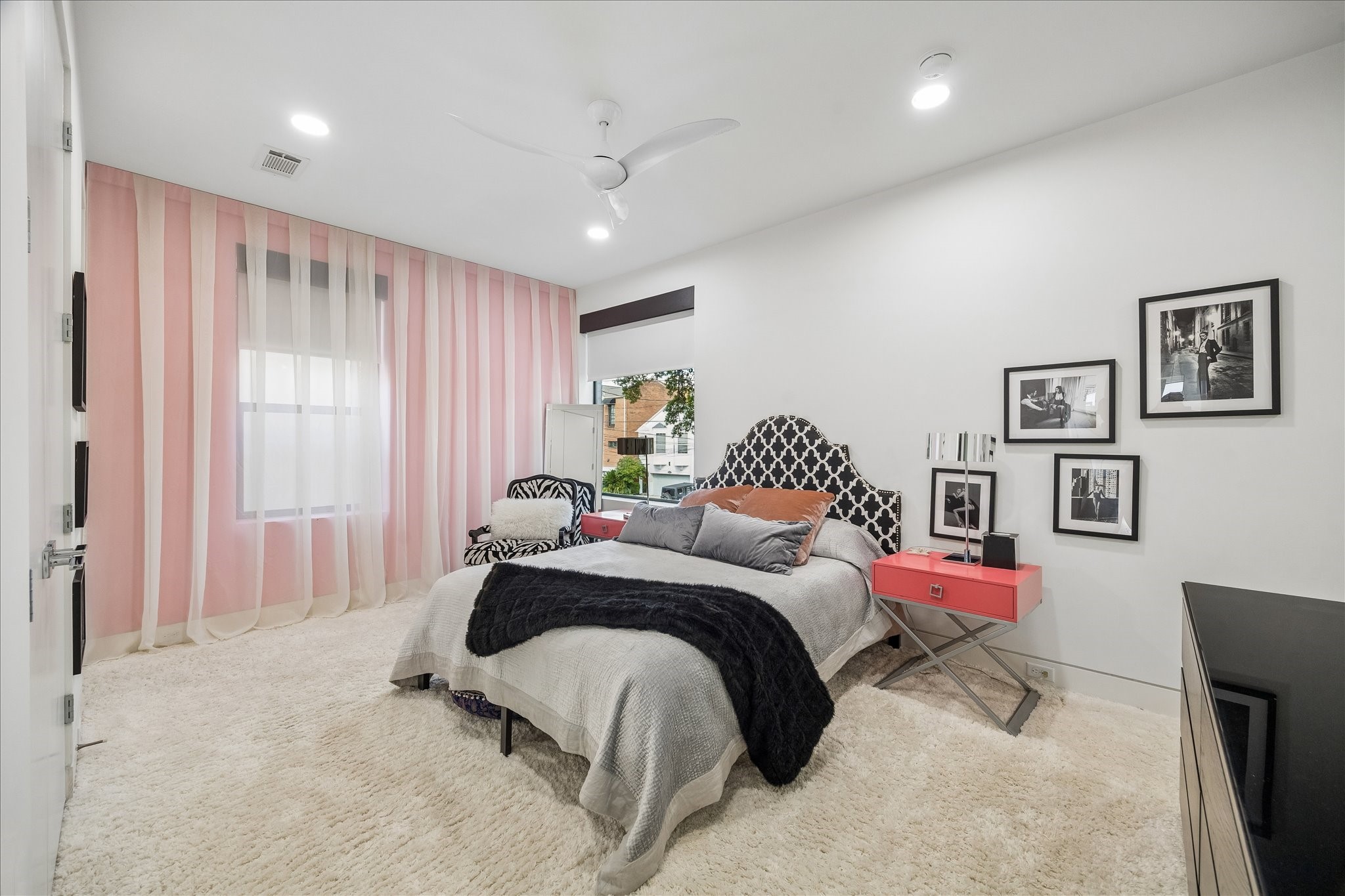 2014 Park Street Houston, TX 77019 - Photo 26 of 40 Secondary bedroom on the 2nd floor. Electronic shades, pretty drapes and abundant wall space.