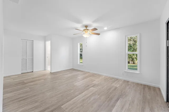 a outdoor space with wooden floor and iron stairs