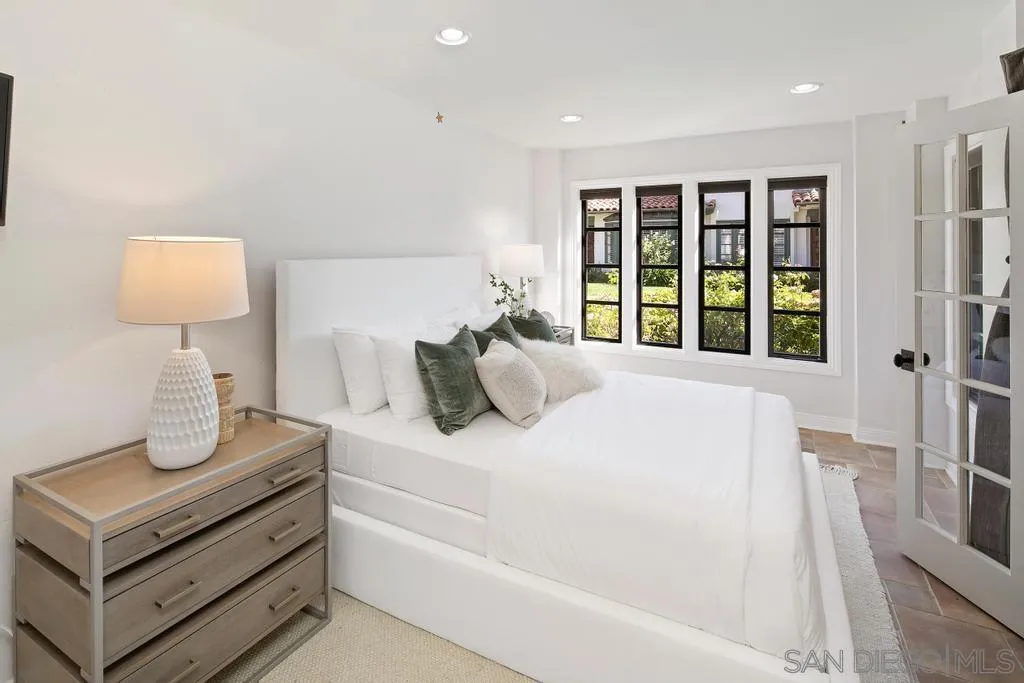 6117 La Flecha Rancho Santa Fe, CA 92067 - Photo 18 of 37 a bedroom with a bed and a night stand