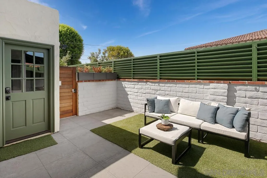 6117 La Flecha Rancho Santa Fe, CA 92067 - Photo 26 of 37 a view of a patio with couches table and chairs and potted plants