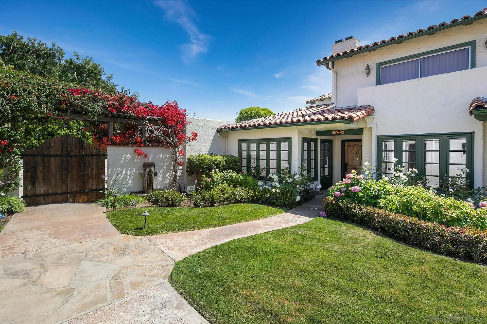 6117 La Flecha Rancho Santa Fe, CA 92067 - Photo 37 of 37 a front view of a house with garden
