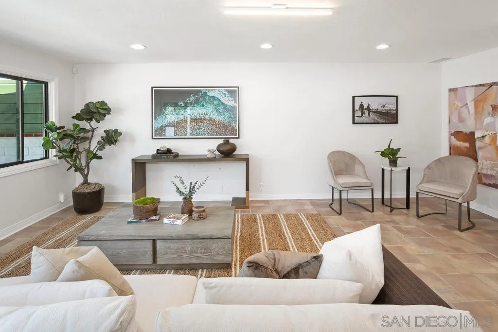 6117 La Flecha Rancho Santa Fe, CA 92067 - Photo 10 of 37 a living room with furniture and a potted plant