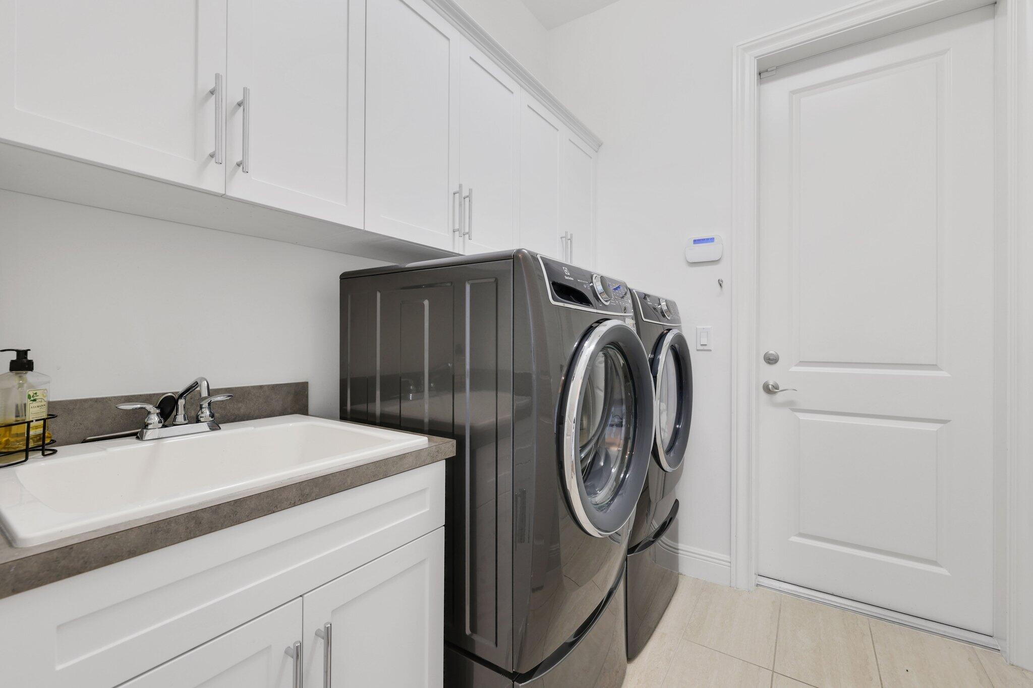 6813 Northwest 25th Way Boca Raton, FL 33496 - Photo 69 of 83 Laundry room