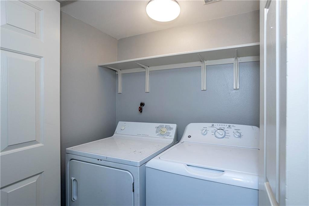 1326 Delano Street Austin, TX 78721 - Photo 18 of 23 Laundry area with separate washer and dryer