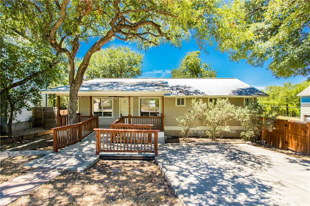 1326 Delano Street Austin, TX 78721 - Photo 2 of 23 Back of property featuring a porch and crawl space