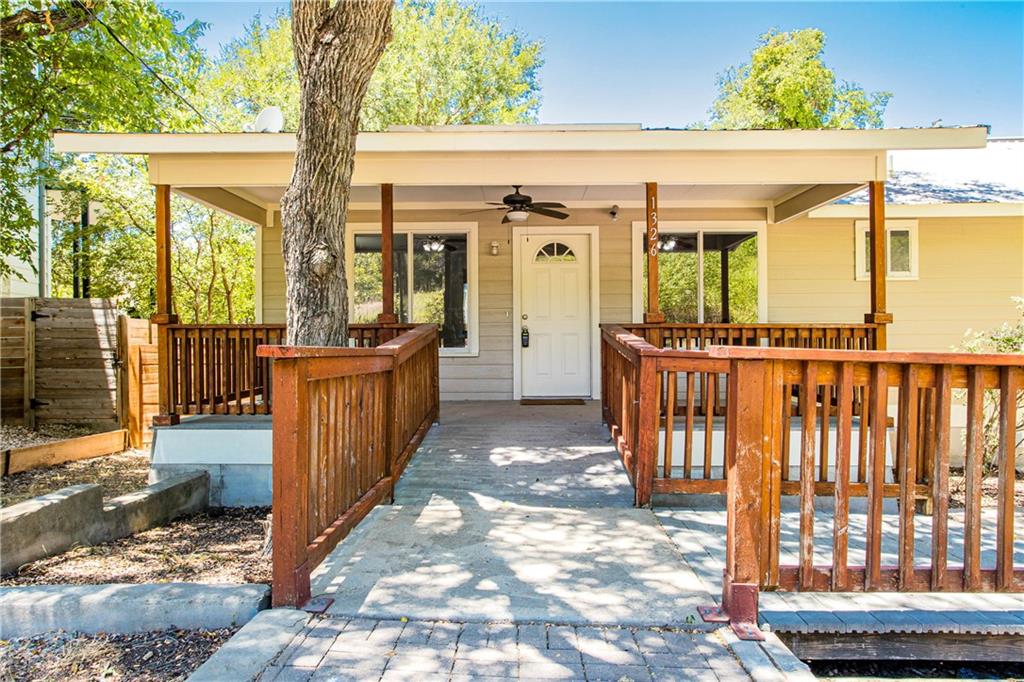 1326 Delano Street Austin, TX 78721 - Photo 5 of 23 Doorway to property with ceiling fan and a porch