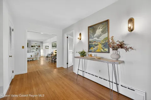 a bed room with a bed and mirror