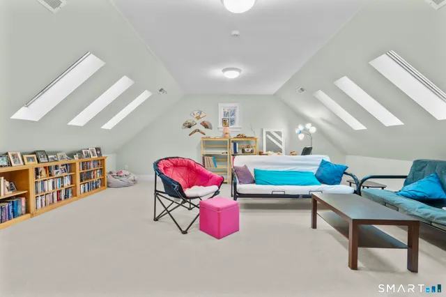 a bathroom with a toilet and a bathtub