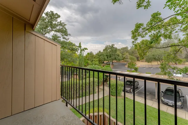 a balcony with an outdoor space
