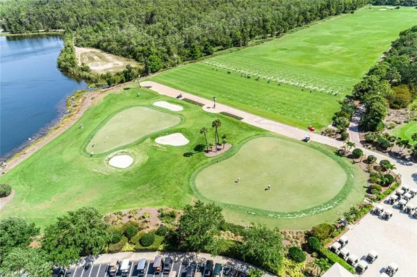 a view of a golf course with a lake