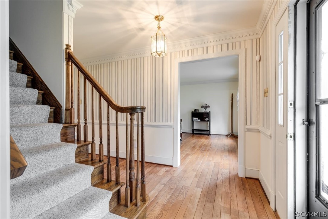 4300 Moseley Road Moseley, VA 23120 - Photo 6 of 32 a view of a hallway view with wooden floor and staircase