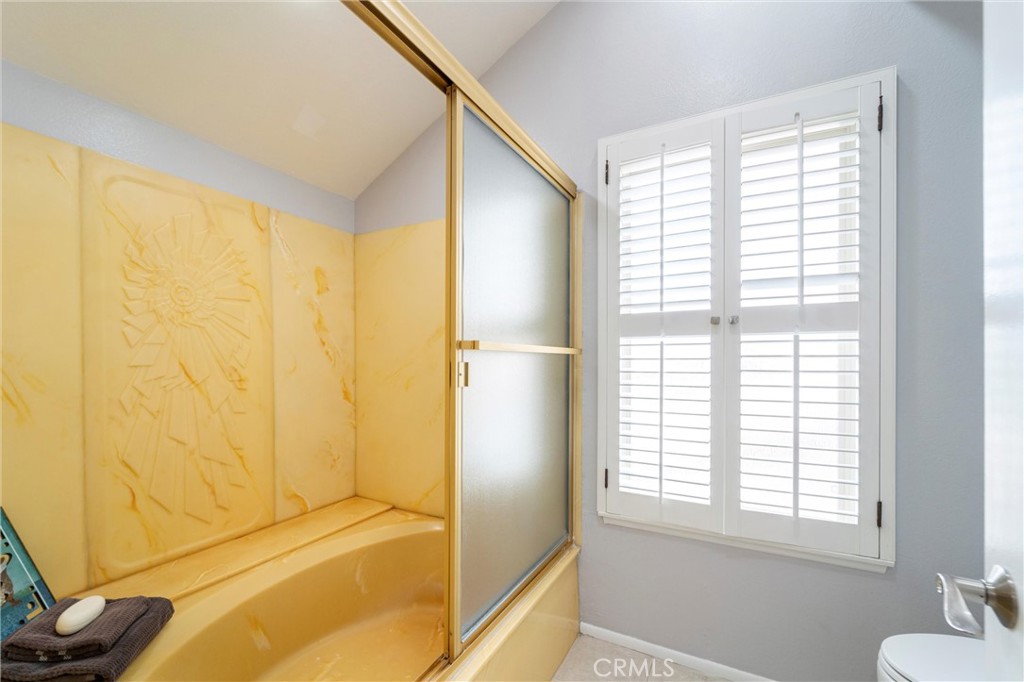 607 Valley Forge Drive Placentia, CA 92870 - Photo 36 of 57 a bathroom with a bathtub and shower