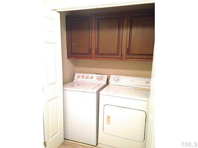 6420 English Oaks Drive Raleigh, NC 27615 - Photo 15 of 21 Laundry with storage