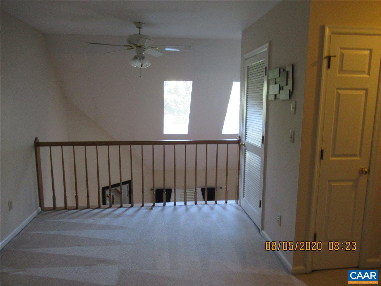 2 Ridgeview Circle Charlottesville, VA 22902 - Photo 18 of 22 wooden floor in a hall with a window