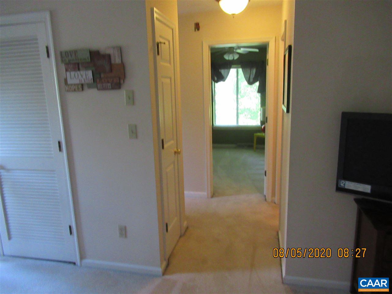 2 Ridgeview Circle Charlottesville, VA 22902 - Photo 21 of 22 a view of a bathroom from a hallway