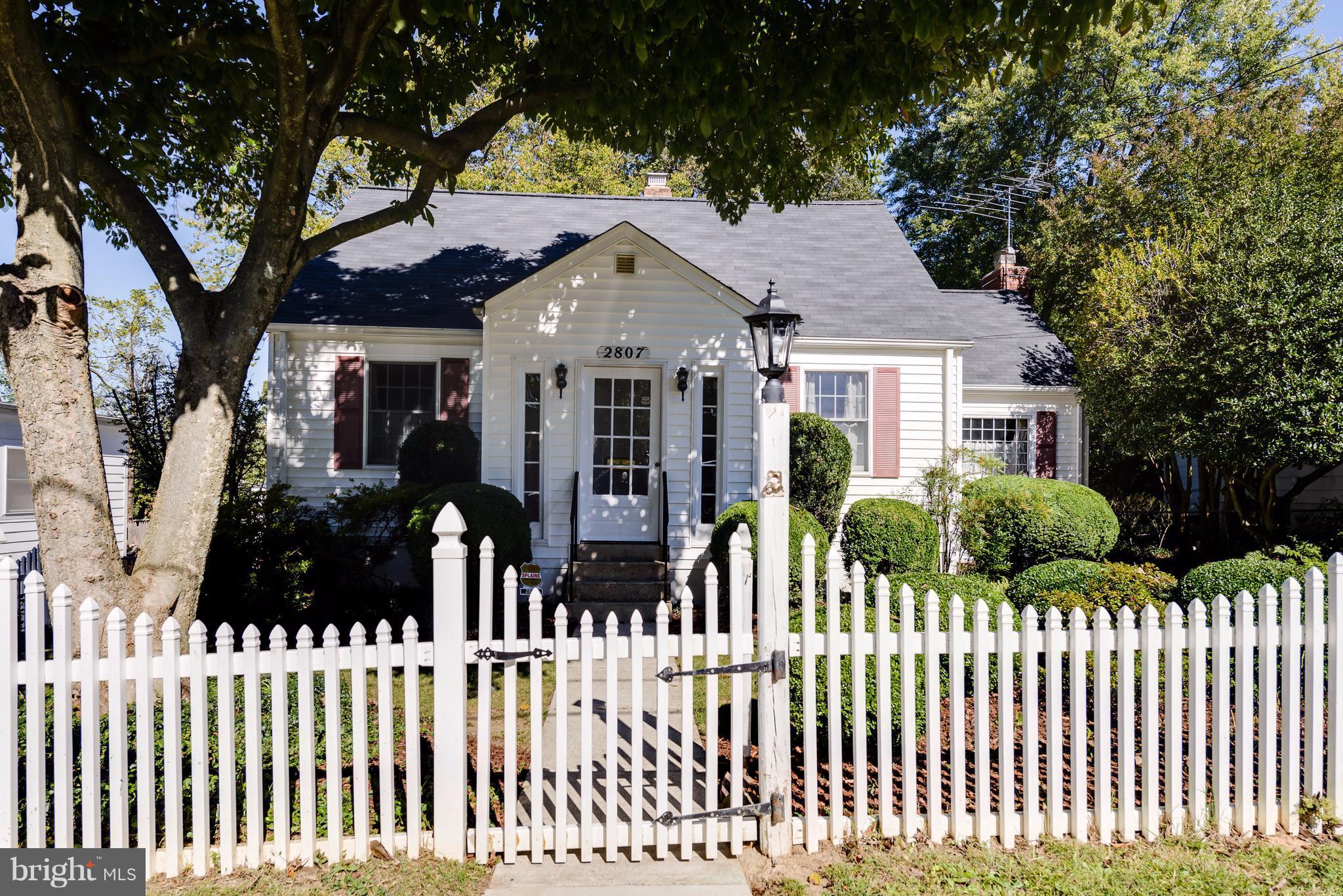 2807 Munson Street Silver Spring, MD 20902 - Photo 1 of 30 Storybook cape with picket fence lets you...