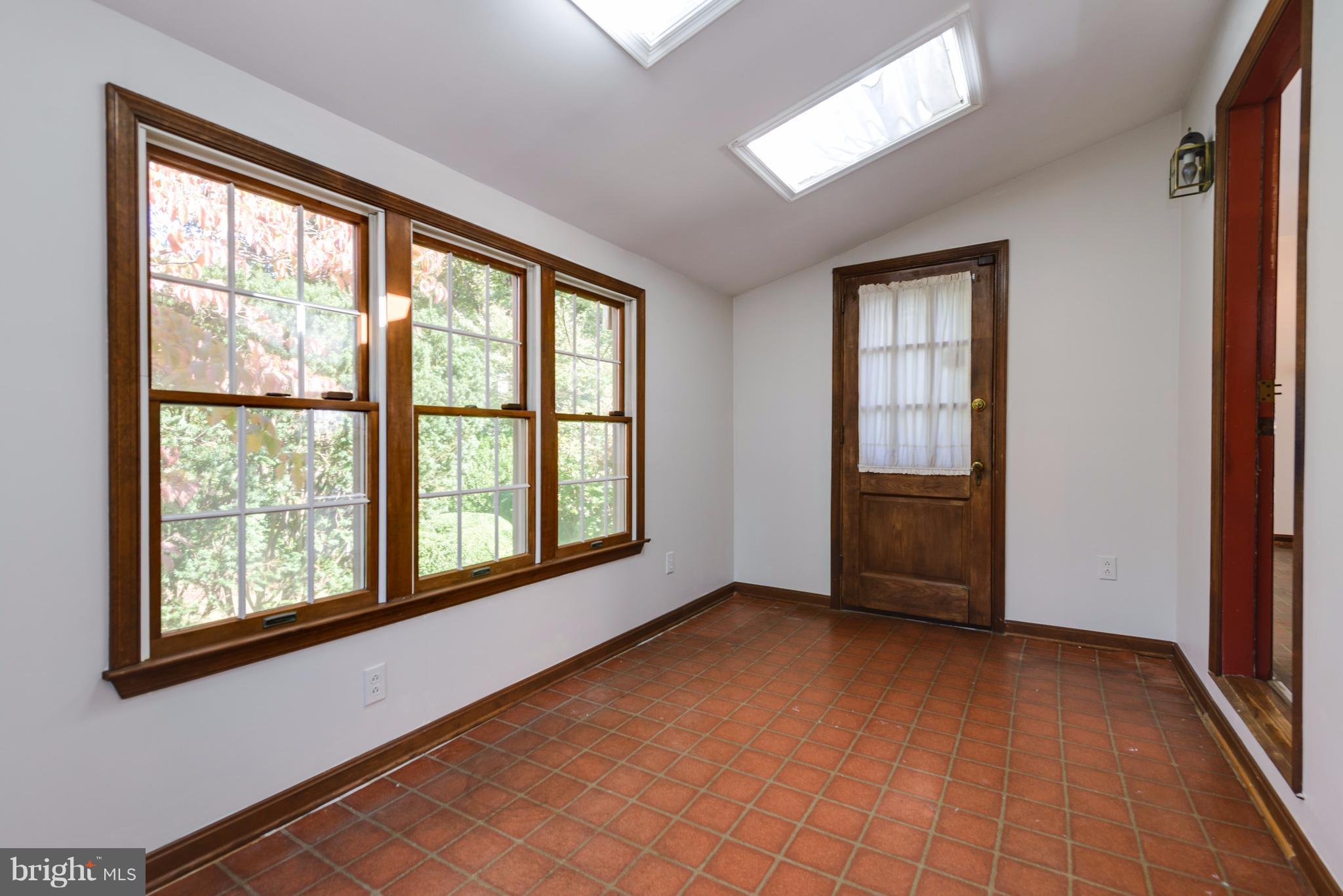 2807 Munson Street Silver Spring, MD 20902 - Photo 13 of 30 Enclosed back porch off kitchen with skylight