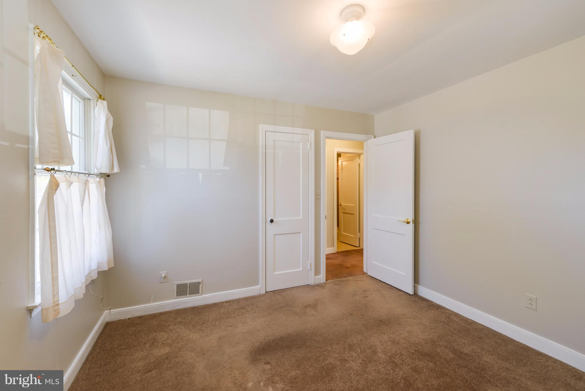 2807 Munson Street Silver Spring, MD 20902 - Photo 15 of 30 Front bedroom has wood under carpet