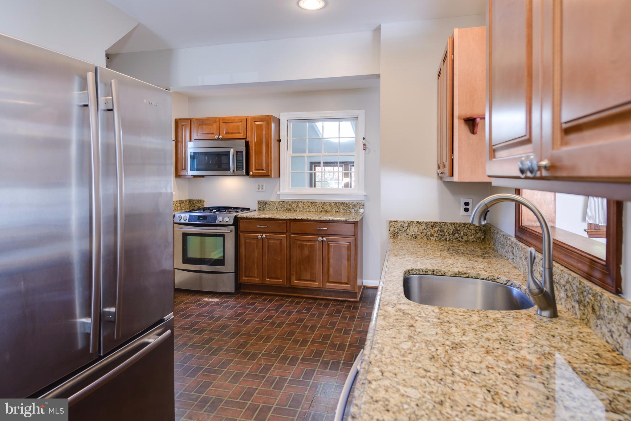 2807 Munson Street Silver Spring, MD 20902 - Photo 7 of 30 Updated kitchen with granite and stainless