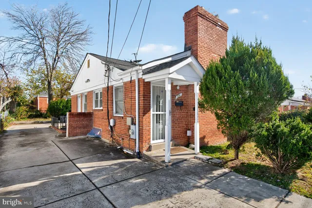a view of a house with a street