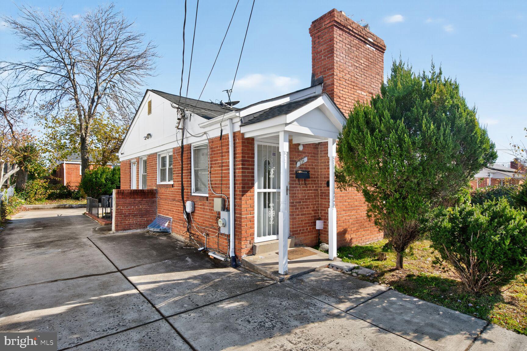 a view of a house with a street
