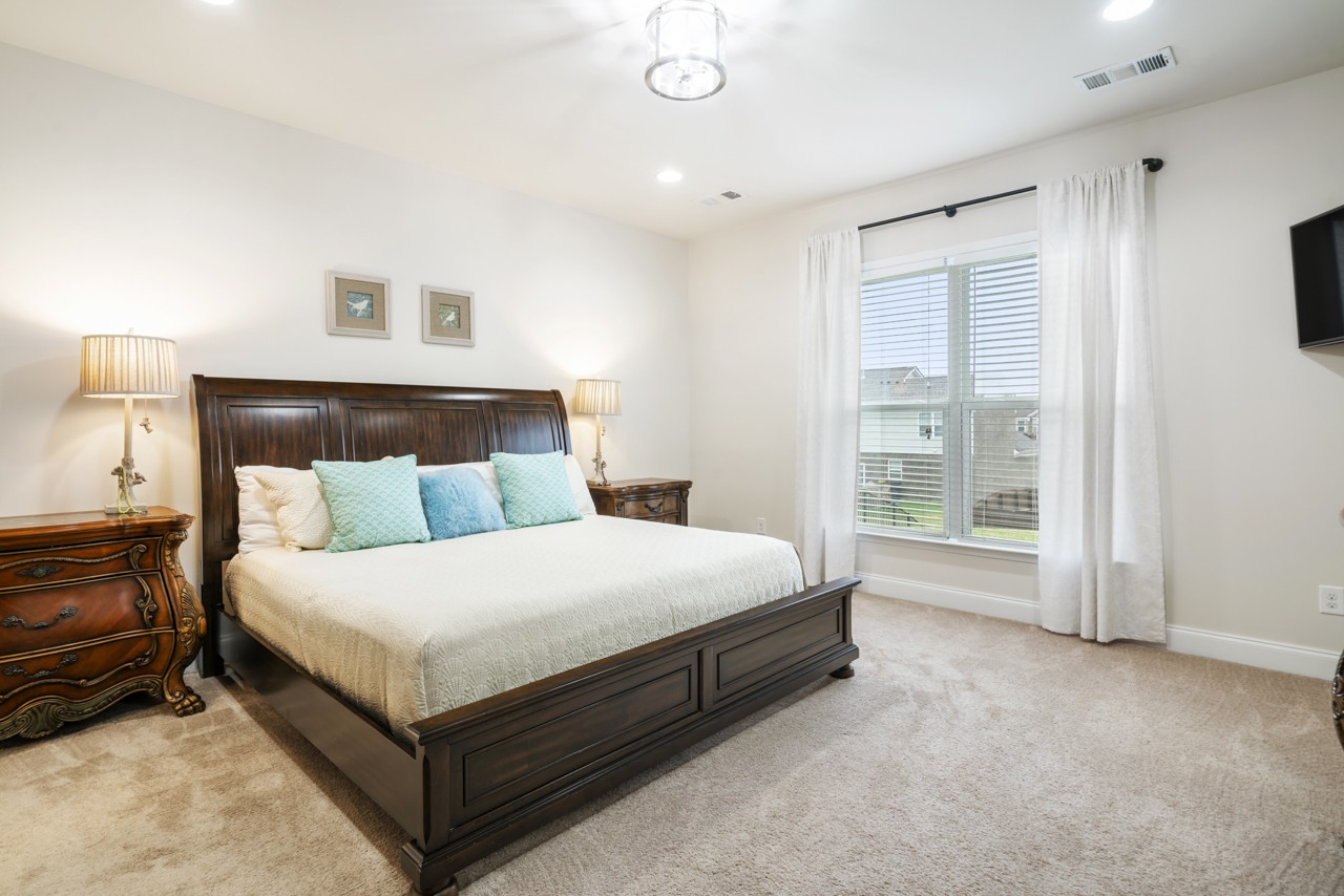 2995 Liverpool Drive Spring Hill, TN 37174 - Photo 16 of 37 a bed room with a bed and a window