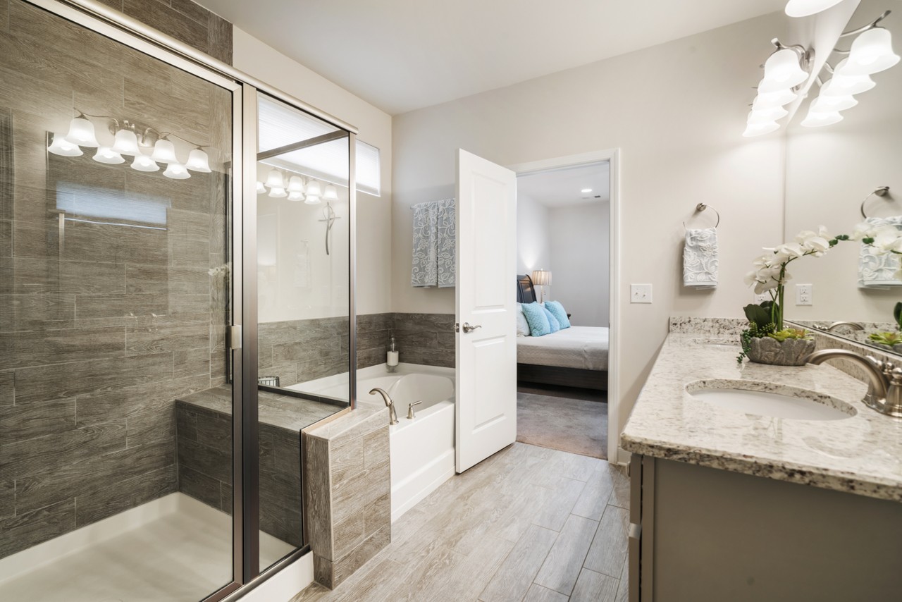 2995 Liverpool Drive Spring Hill, TN 37174 - Photo 20 of 37 a en suite spacious bathroom with a granite countertop tub sink and mirror