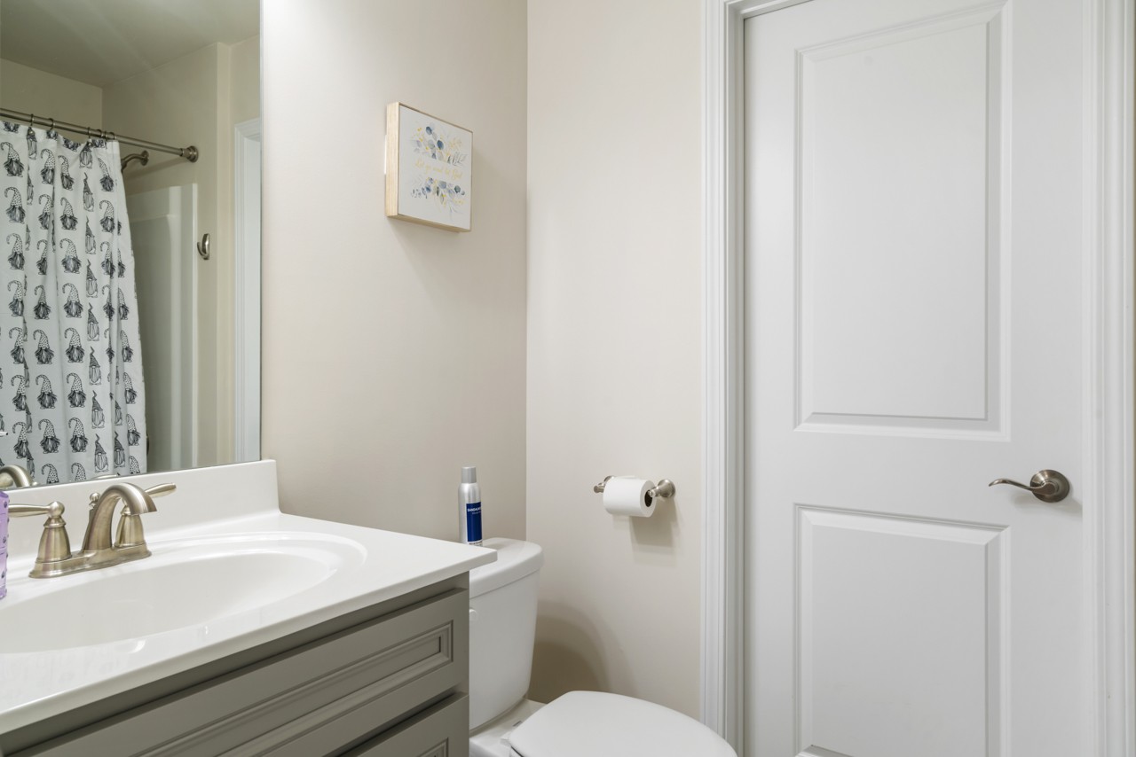 2995 Liverpool Drive Spring Hill, TN 37174 - Photo 27 of 37 a bathroom with a sink a toilet and shower