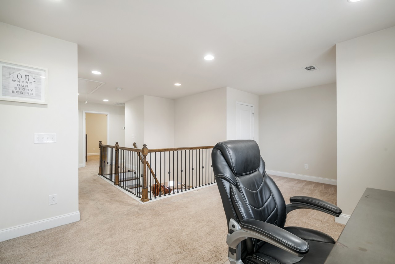 2995 Liverpool Drive Spring Hill, TN 37174 - Photo 28 of 37 a view of a hallway with workspace and windows