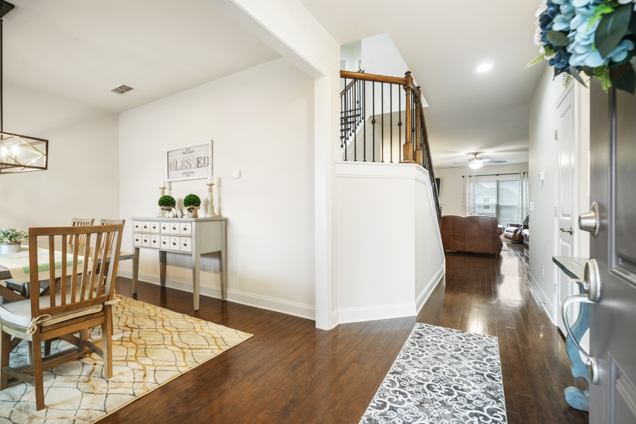 2995 Liverpool Drive Spring Hill, TN 37174 - Photo 3 of 37 a dining room with furniture and a rug
