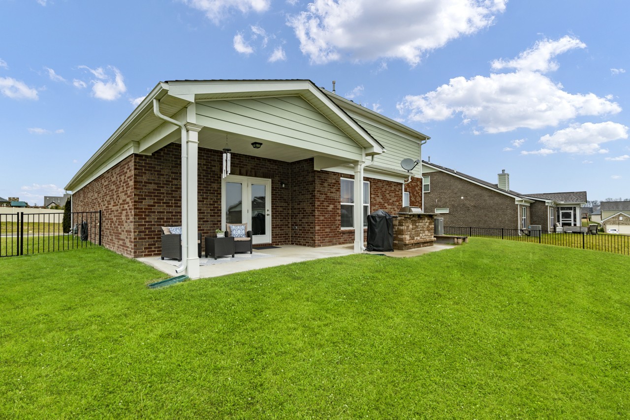 2995 Liverpool Drive Spring Hill, TN 37174 - Photo 32 of 37 a view of a house with a backyard