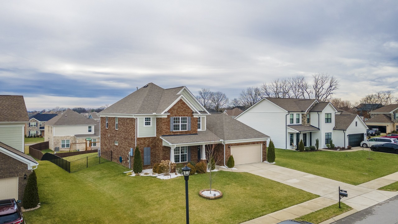 2995 Liverpool Drive Spring Hill, TN 37174 - Photo 33 of 37 front view of a house with a yard