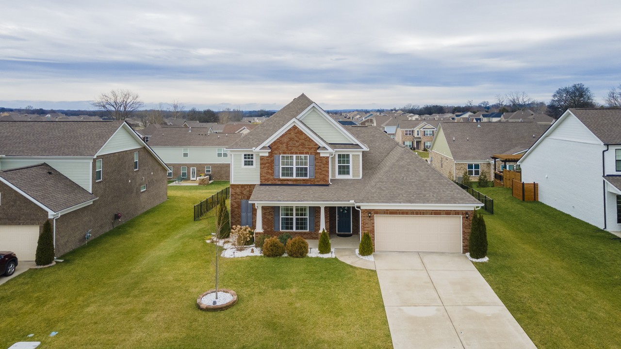 2995 Liverpool Drive Spring Hill, TN 37174 - Photo 34 of 37 an aerial view of a house with swimming pool