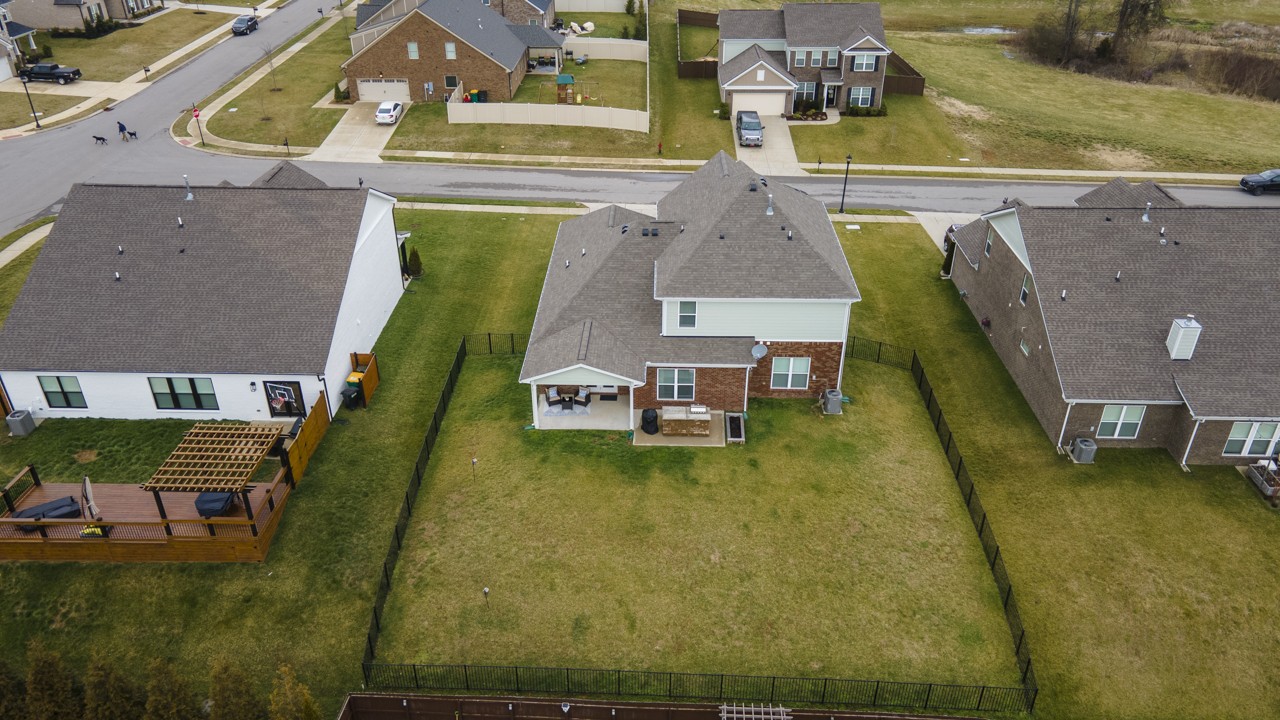 2995 Liverpool Drive Spring Hill, TN 37174 - Photo 36 of 37 an aerial view of a house with swimming pool