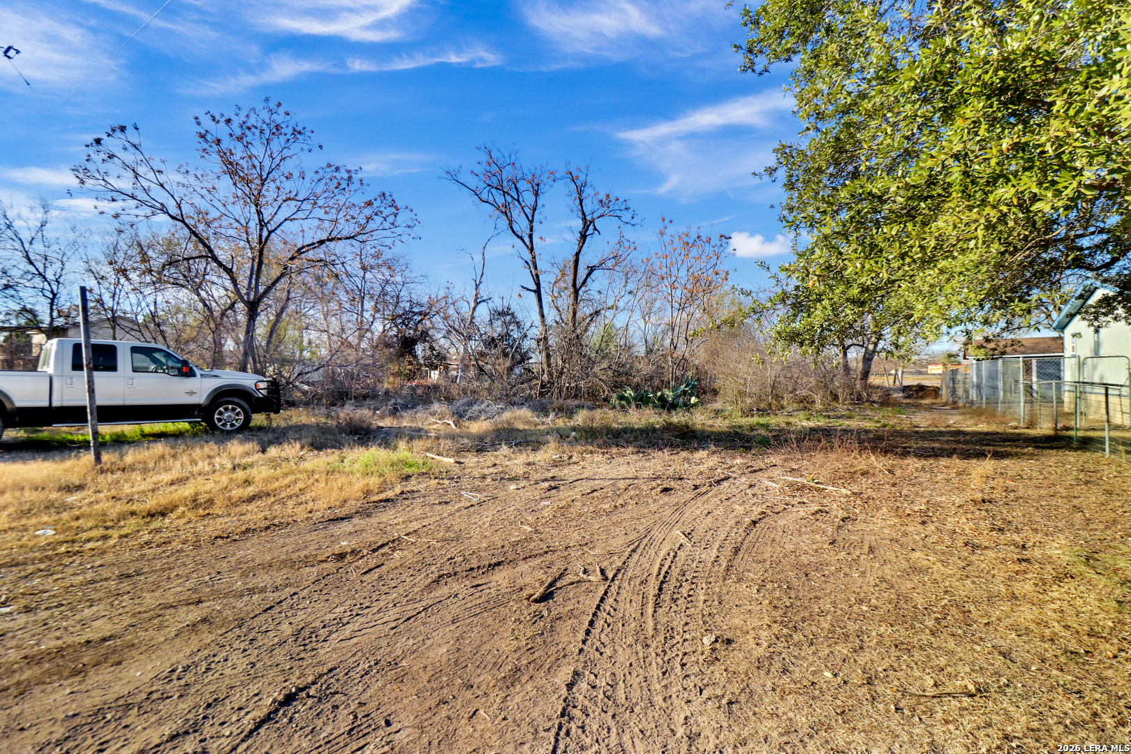 13630 Interstate 35 Access Road Von Ormy, TX 78073 - Photo 3 of 12 a view of a yard with trees