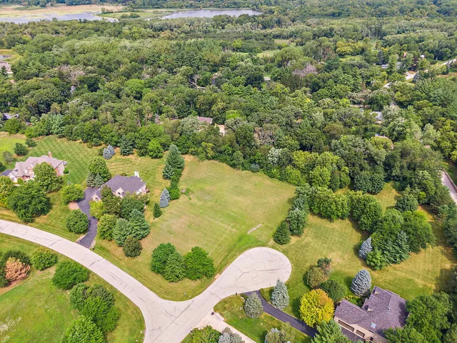 a view of a lake with a yard