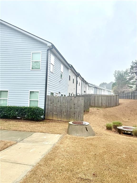 2188 Justify Lane, Unit 40 Lithonia, GA 30058 - Photo 2 of 21 a view of a backyard of a house