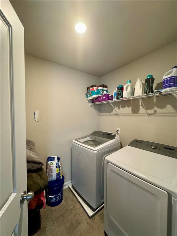 2188 Justify Lane, Unit 40 Lithonia, GA 30058 - Photo 21 of 21 a utility room with dryer and washer