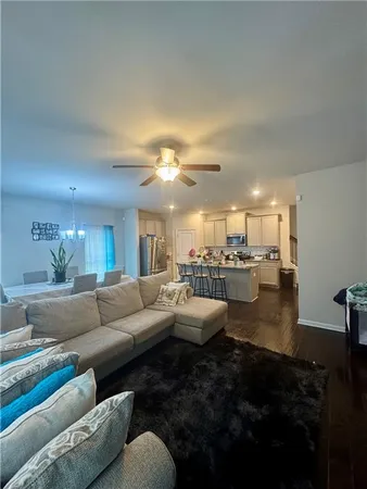a living room with furniture and a view of living room